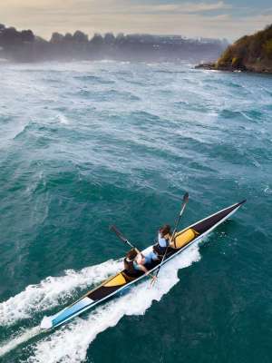 Firefly team rowing, race, ocean, waves, motion, aerial photography, negative space 87844